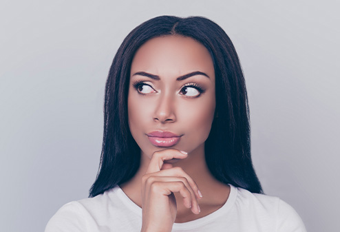 Woman holding her chin