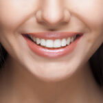 Closeup of a woman with a beautiful, white, straight smile